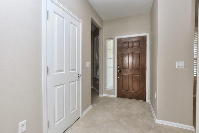 view of tiled foyer entrance