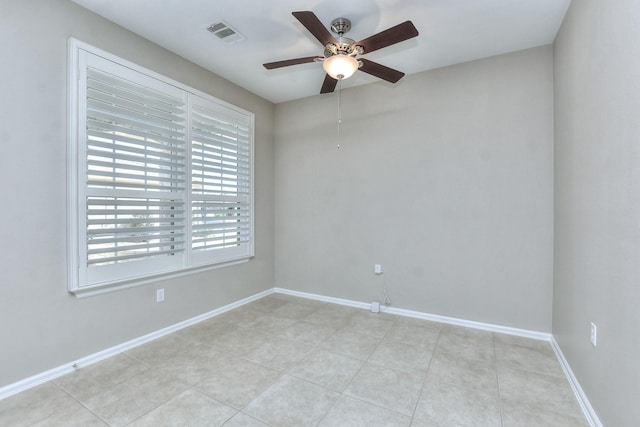 empty room featuring ceiling fan