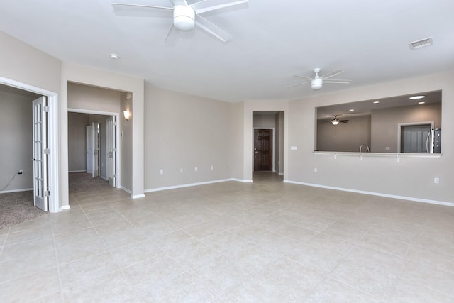 unfurnished living room with light tile patterned floors