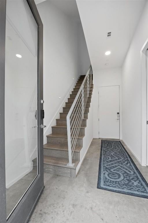 3100 Menchaca Rd Unit 29, Austin, TX 78704 - entryway with unfinished concrete floors and stairs