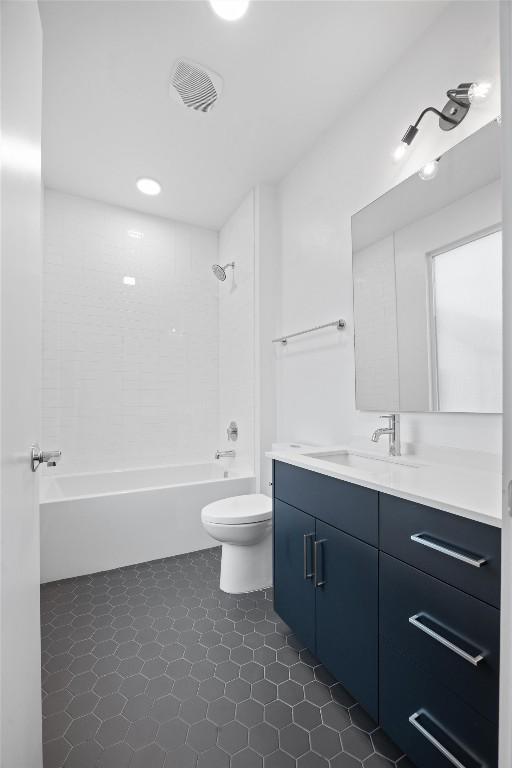 3100 Menchaca Rd Unit 29, Austin, TX 78704 - bathroom with vanity, shower / tub combination, and tile patterned floors