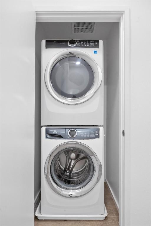 3100 Menchaca Rd Unit 29, Austin, TX 78704 - laundry area featuring stacked washer / dryer