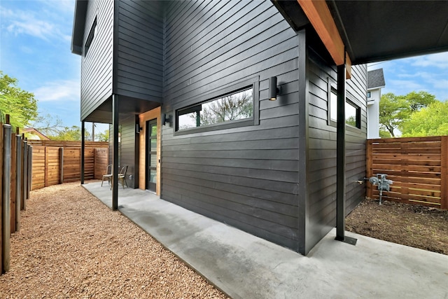 view of home's exterior with a patio area