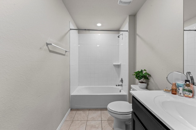 full bathroom featuring tile patterned floors, toilet, vanity, and tiled shower / bath combo