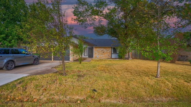 view of front of house with a lawn