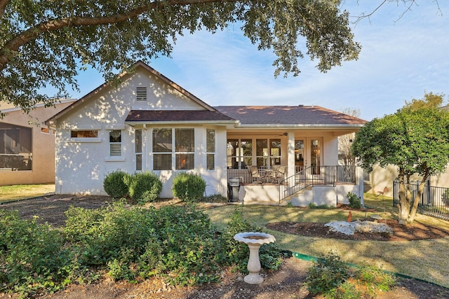 back of house with a porch