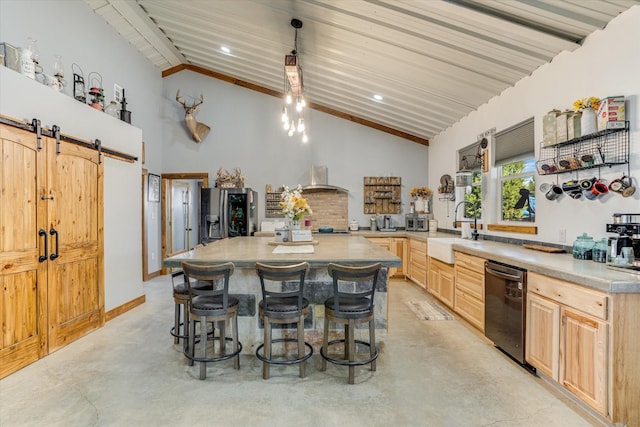 kitchen with a barn door, light brown cabinetry, dishwasher, a kitchen island, and sink