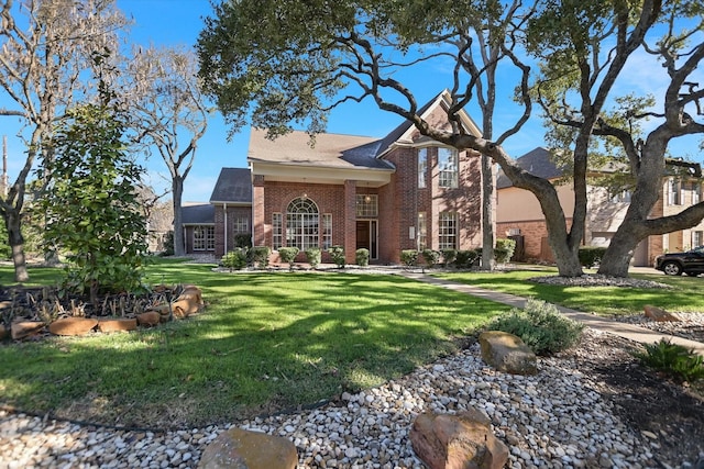 view of front facade with a front lawn