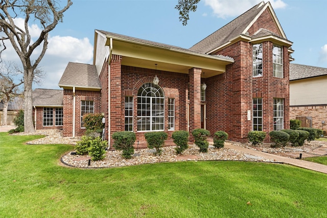 view of front of property with a front lawn