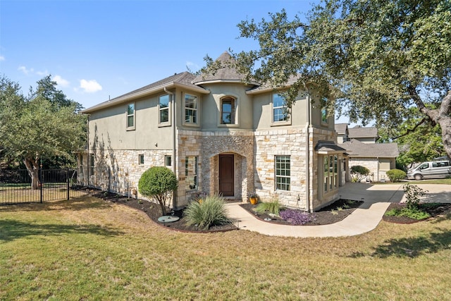 view of front of property with a front lawn