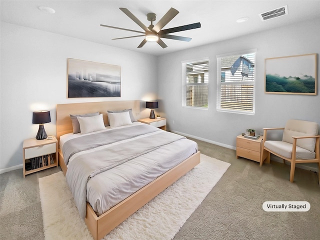 carpeted bedroom featuring ceiling fan