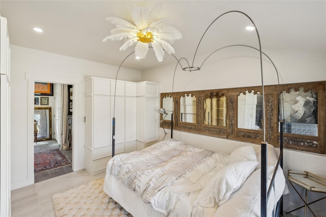 tiled bedroom featuring ceiling fan and a closet