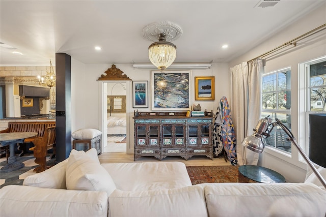 bedroom featuring wood-type flooring and a chandelier