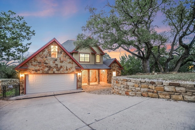 view of front of home with a garage