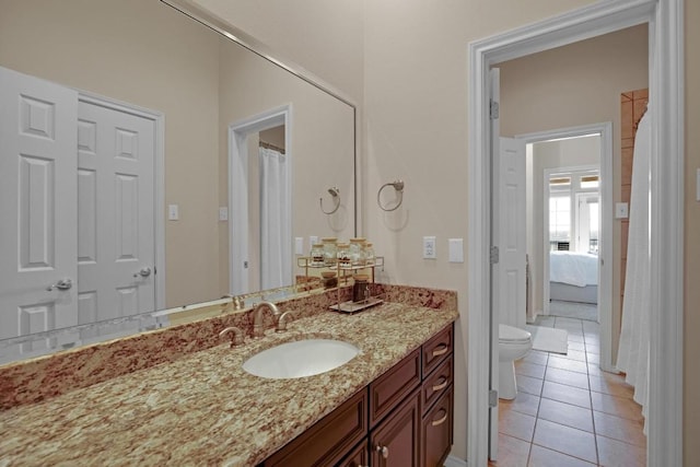 2918 Ranch Road 620 N Unit L-177, Austin, TX 78734 - ensuite bathroom featuring vanity and tile patterned floors