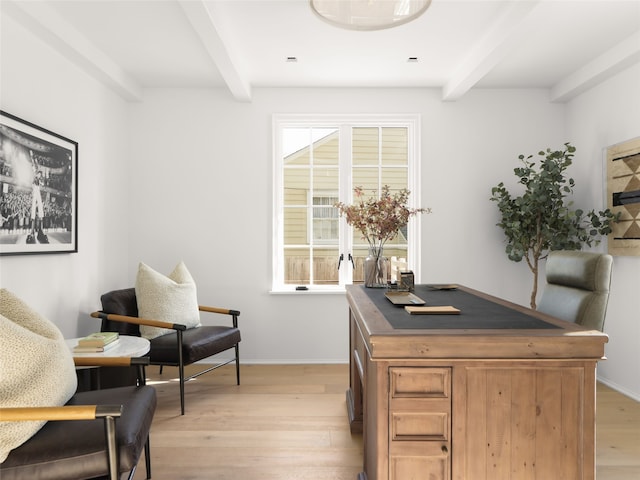 office area with beam ceiling and light wood-type flooring