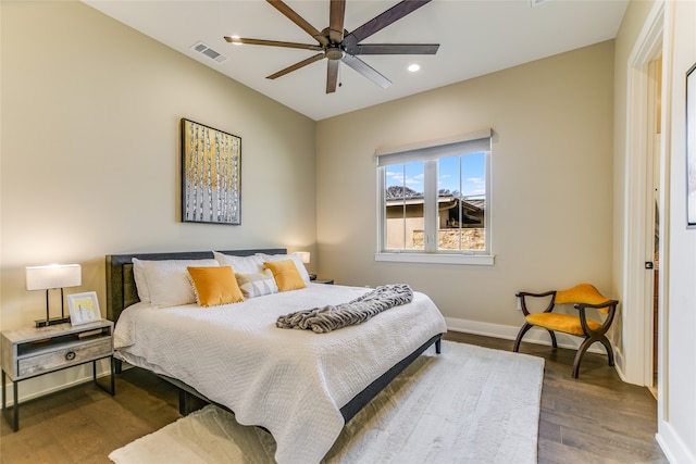 bedroom featuring ceiling fan and hardwood / wood-style flooring