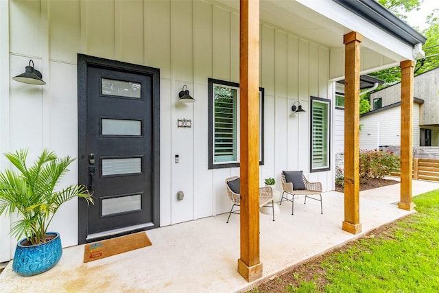 property entrance featuring covered porch