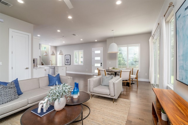 living room with light hardwood / wood-style floors