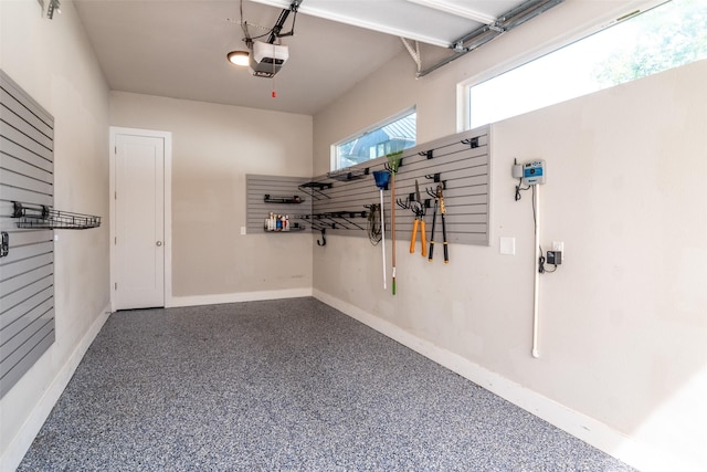 garage featuring a garage door opener