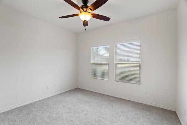 unfurnished room with carpet floors and ceiling fan