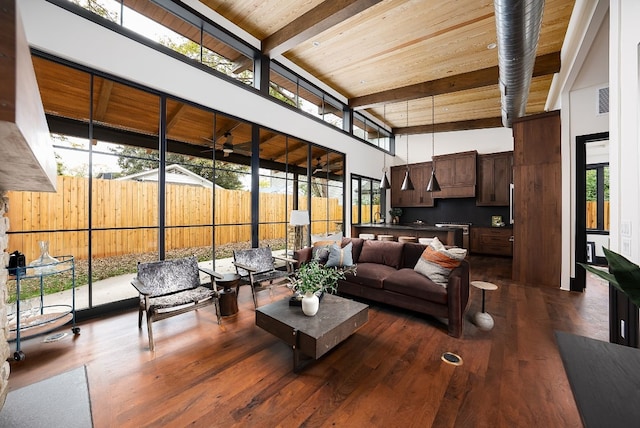 1808 Riverview St Unit B, Austin, TX 78702 - living area with wooden ceiling with exposed beams, wood finished floors, and a high ceiling