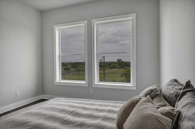 bedroom featuring hardwood / wood-style flooring