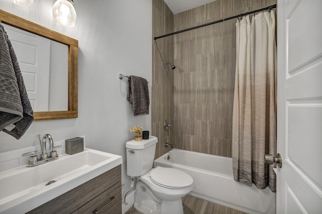 full bathroom with toilet, vanity, and shower / bath combination with curtain