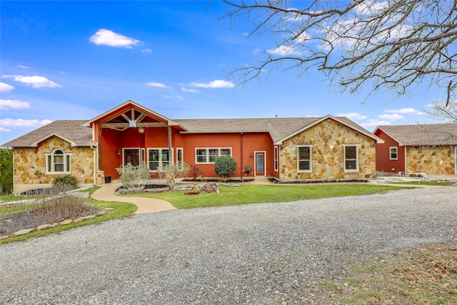 ranch-style home with a front yard