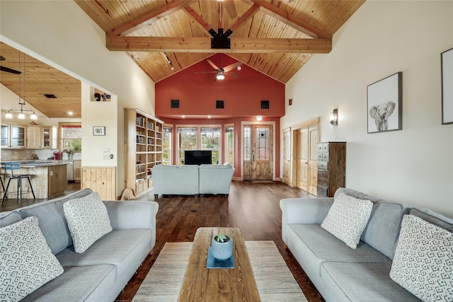 living room with wood ceiling, hardwood / wood-style floors, ceiling fan, high vaulted ceiling, and beamed ceiling