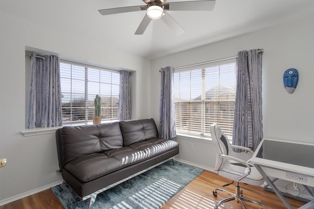 office space with ceiling fan and wood-type flooring