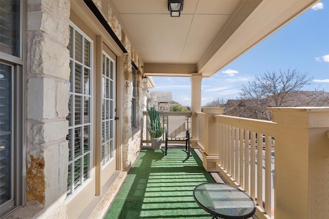 balcony featuring french doors