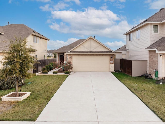 view of front of house with a front yard and a garage