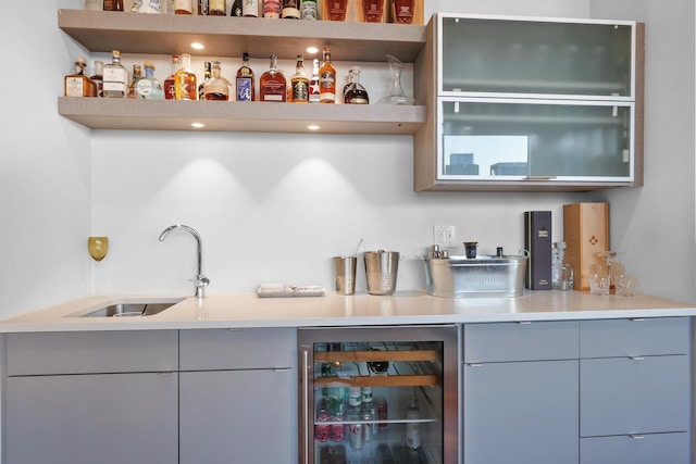 bar featuring sink and wine cooler