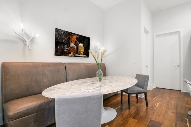 dining space featuring dark hardwood / wood-style flooring