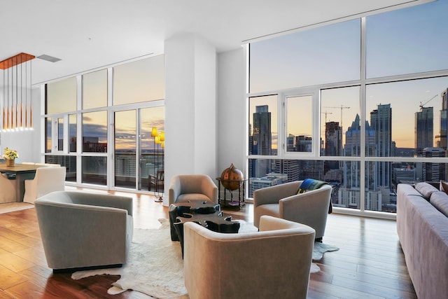 living room featuring hardwood / wood-style floors and expansive windows