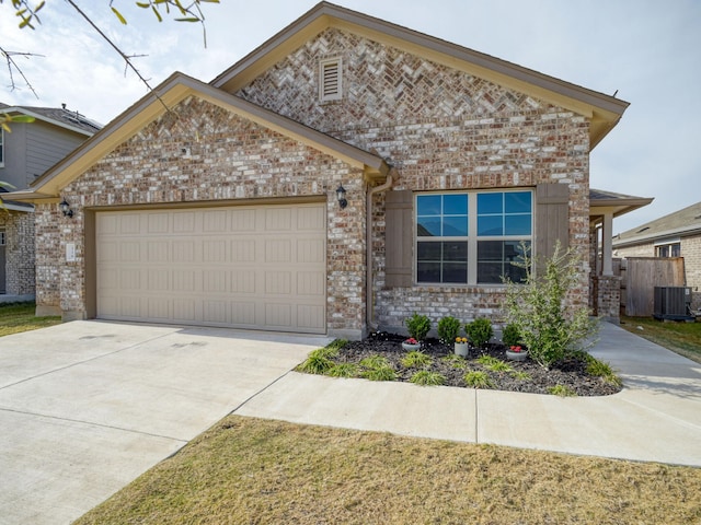 view of front of property featuring brick siding, central AC, concrete driveway, and an attached garage