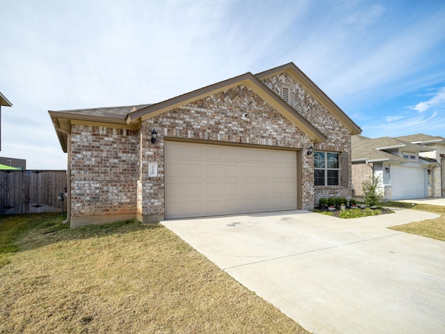 single story home featuring a front lawn and a garage