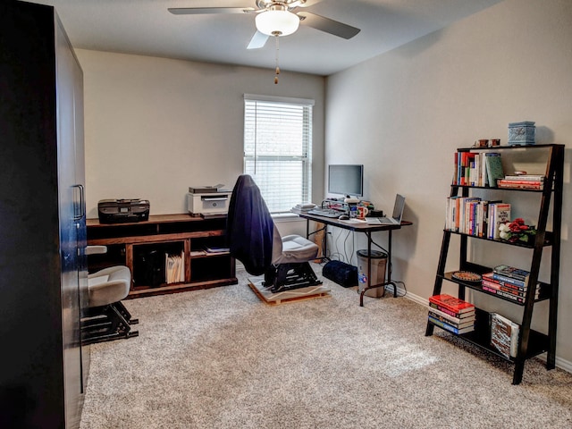 carpeted office with ceiling fan