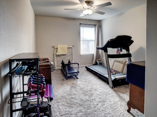 exercise area with carpet floors and ceiling fan