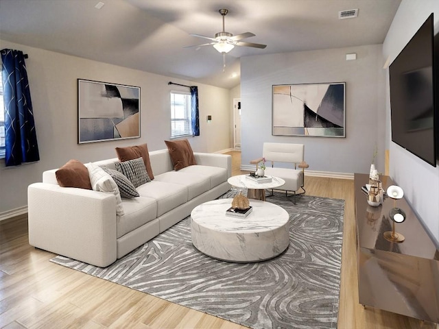 116 Shagbark Dr, Bastrop, TX 78602 - living room with a ceiling fan, wood finished floors, baseboards, and vaulted ceiling