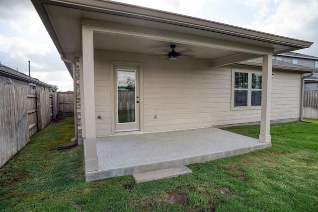 116 Shagbark Dr, Bastrop, TX 78602 - back of house with a ceiling fan and a patio area