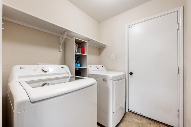 laundry area with separate washer and dryer