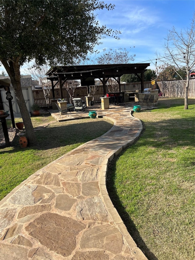 view of yard with a patio area and a pergola