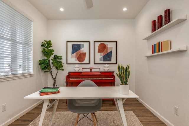 office area with hardwood / wood-style flooring and ceiling fan