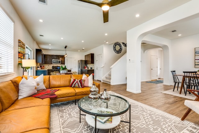 living room with light hardwood / wood-style floors