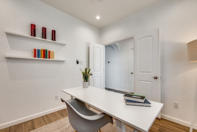 office space featuring dark wood-type flooring