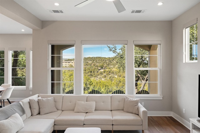 interior space featuring ceiling fan