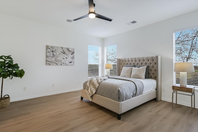 bedroom featuring ceiling fan and light wood-type flooring