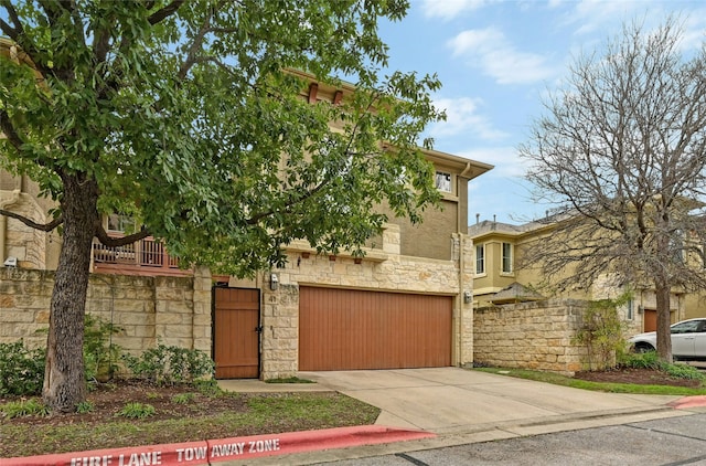 view of front of home with a garage